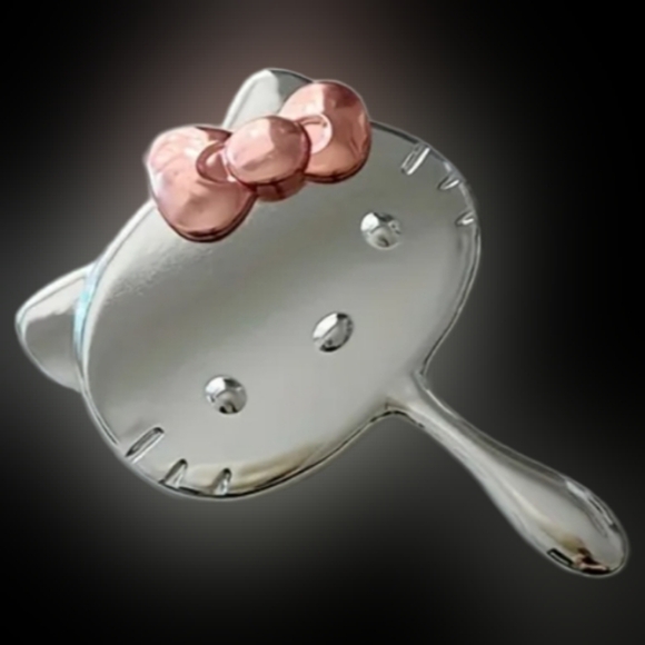 Hello Kitty Silver and Copper Hand Mirror - Picture 1 of 5